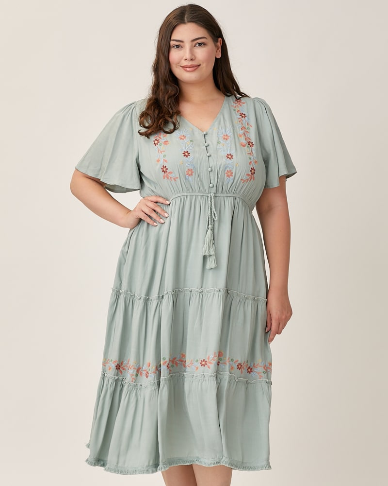 Front of a model wearing a size 2X Floral Emboridered V-Neck Midi Dress in DUSTY SAGE by Polagram. | dia_product_style_image_id:274769